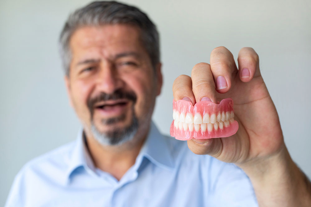 Snap-In Dentures – Procedure, Benefits, Cost, and Tips